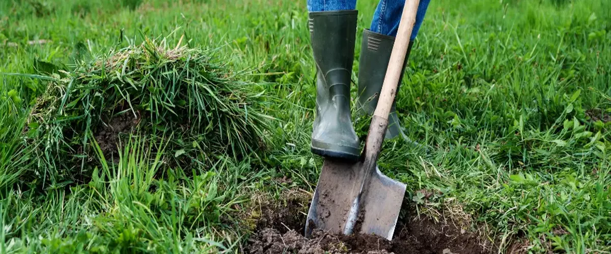 Man digs a hole