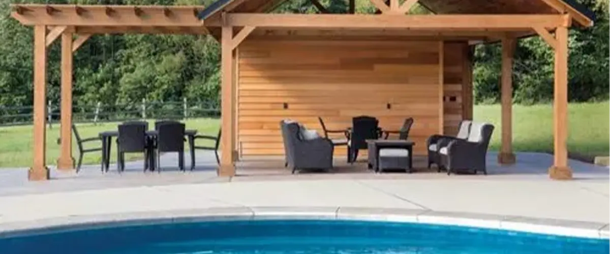 Pergola and a gazebo structure by a pool