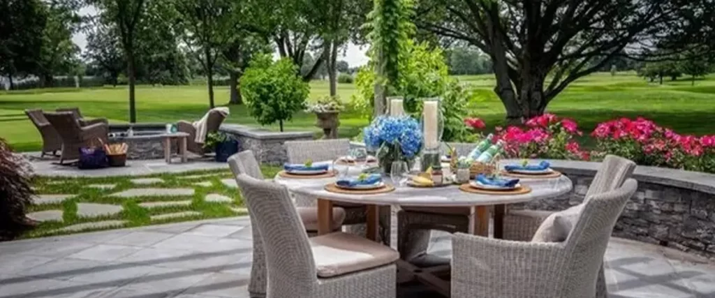 Outdoor living spaces with one table under a pergola