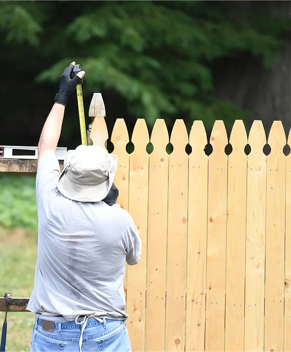 Wood picket fence installation