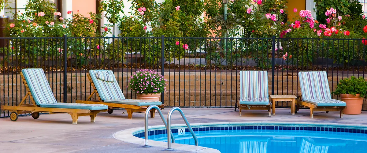 Pool with metal fence