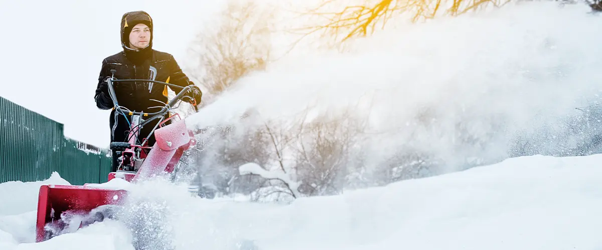 Man From Farrell's Landscaping On Plow Removing Snow In Ohio