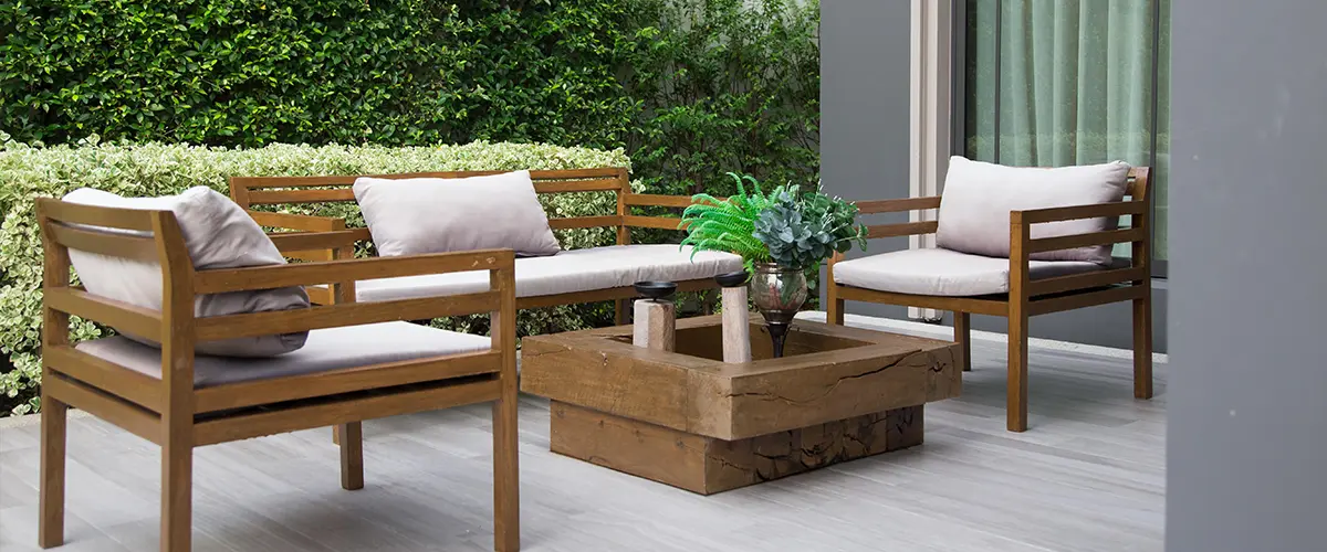 Elegant outdoor patio with wooden seating and modern design