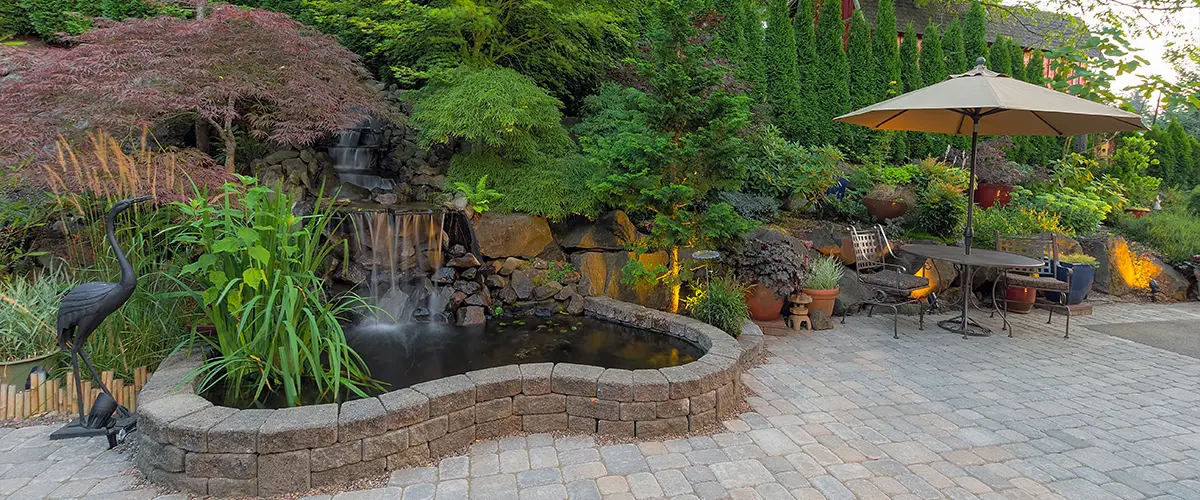 Backyard Landscaping Patio with Waterfall Pond